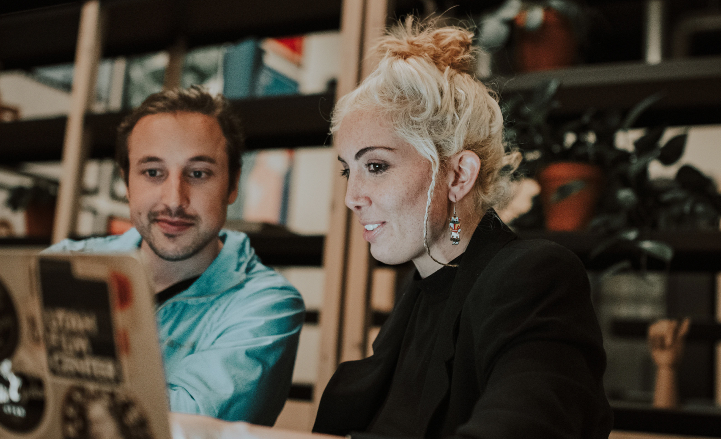 Colleagues wokring on laptop